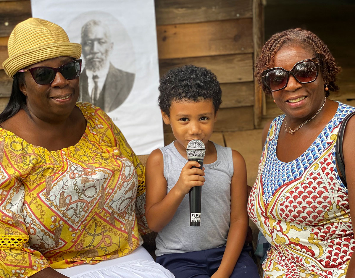 Descendants with historic poster